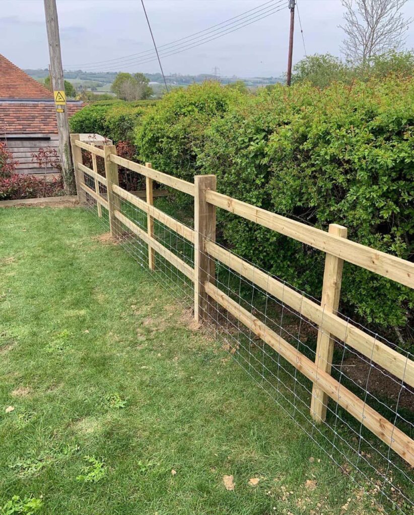 This is a photo of a picket fence and picket gate installed by Fast Fix Fencing Ely